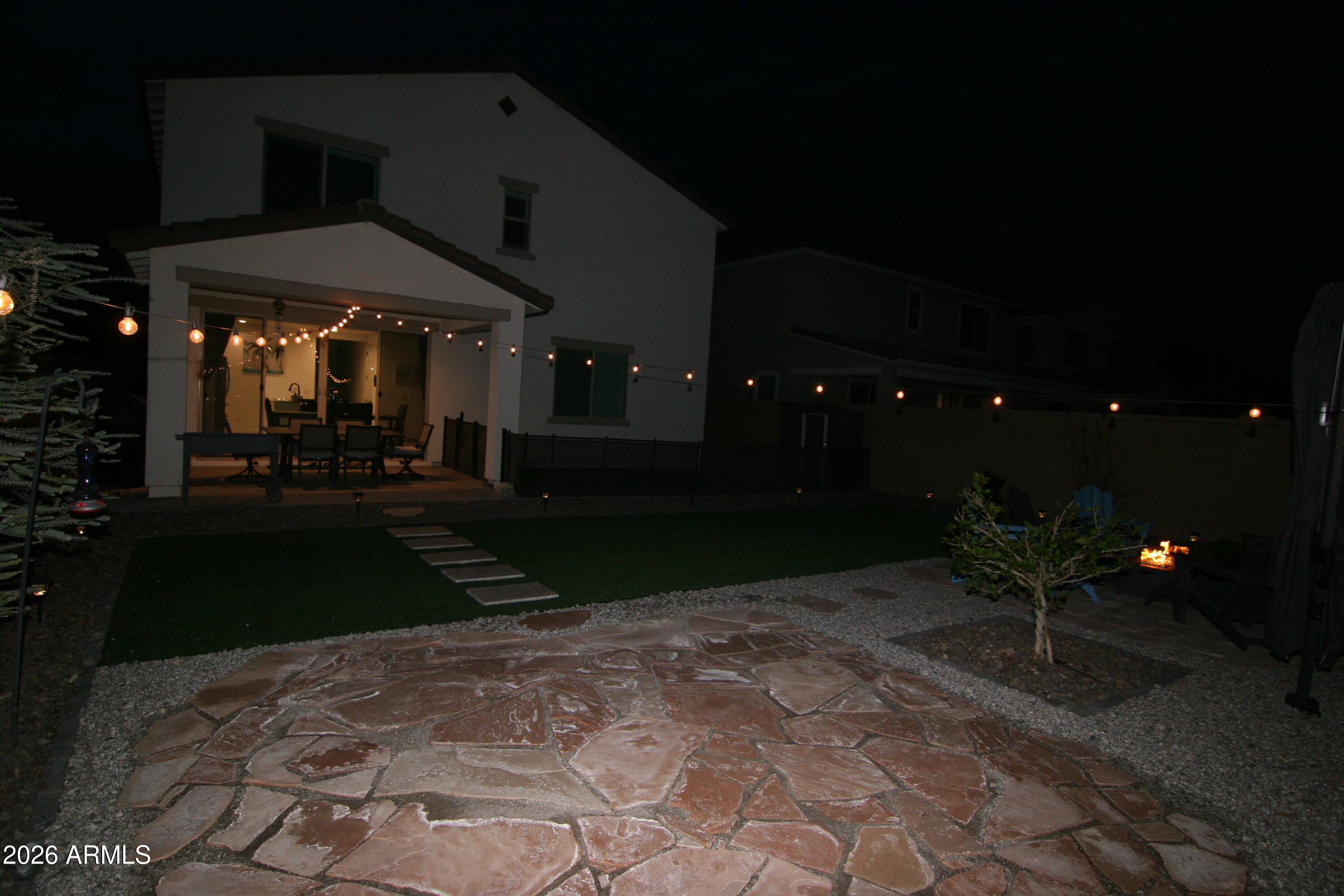 18487 West Ipswitch Way Surprise, AZ 85374 - Photo 31 of 36 a view of a porch with chairs and tables