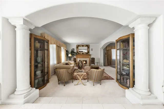 a kitchen with stainless steel appliances granite countertop a refrigerator a sink dishwasher with a stove and cabinets