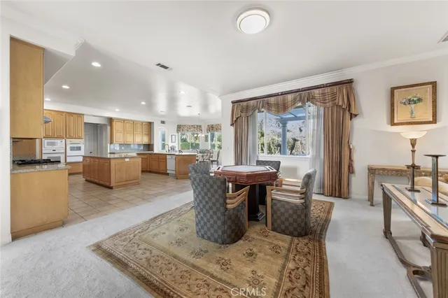 a view of a livingroom with furniture and window