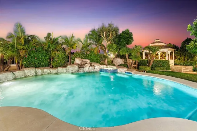 a view of a town with mountains in the background