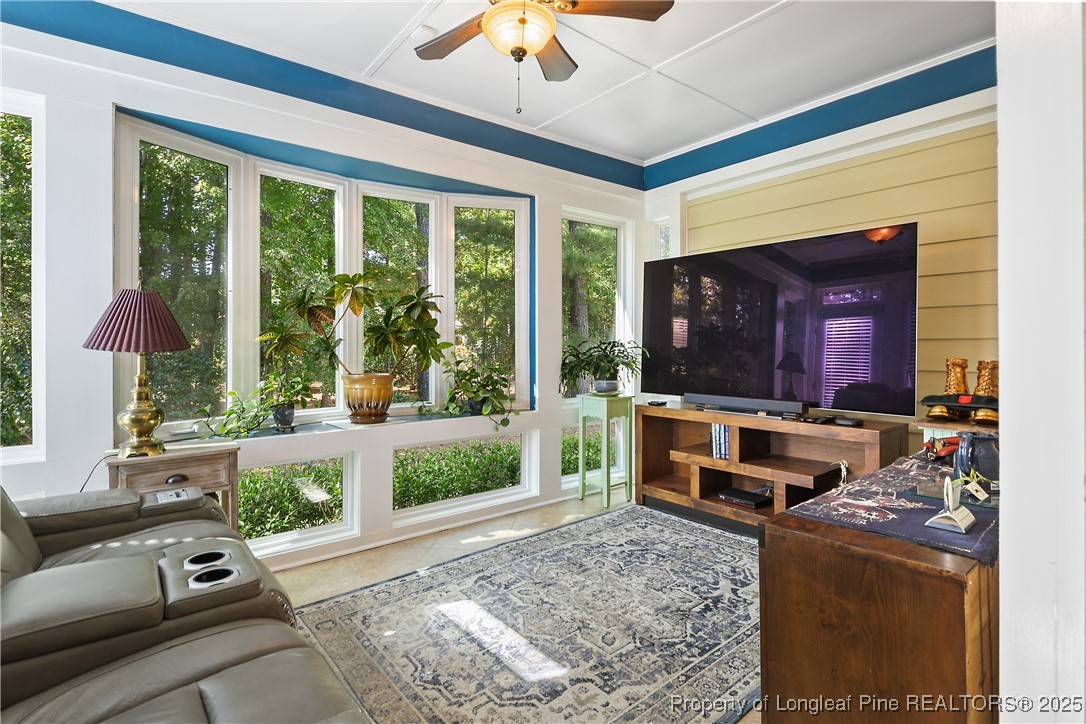 383 Falling Water Road Spring Lake, NC 28390 - Photo 12 of 33 a living room with furniture and a flat screen tv