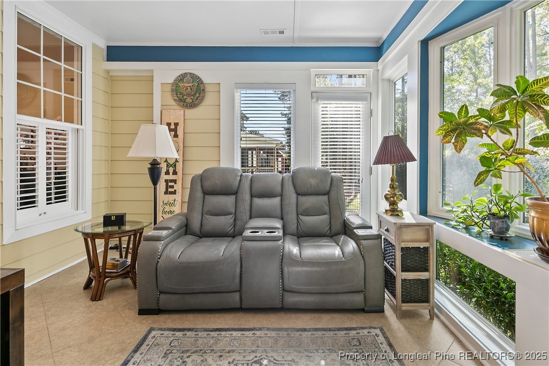 383 Falling Water Road Spring Lake, NC 28390 - Photo 14 of 33 a living room with furniture and a large window