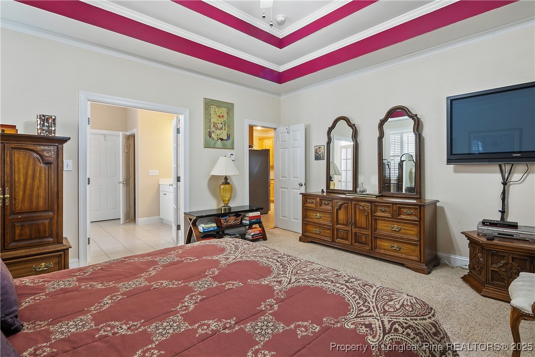 383 Falling Water Road Spring Lake, NC 28390 - Photo 20 of 33 a bedroom with furniture and a dresser