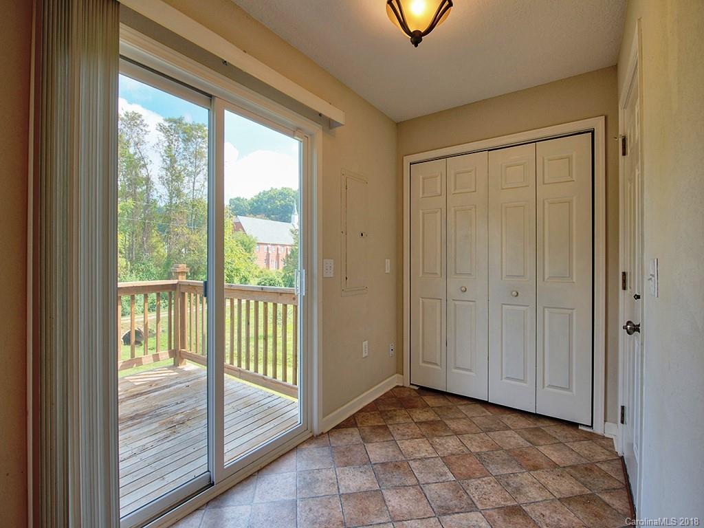 54 Barefoot Ridge Clyde, NC 28721 - Photo 11 of 24 a view of a room with a sink and wooden floor