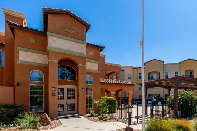 a front view of a building with street view