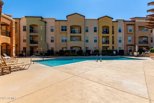 a view of a building with a swimming pool