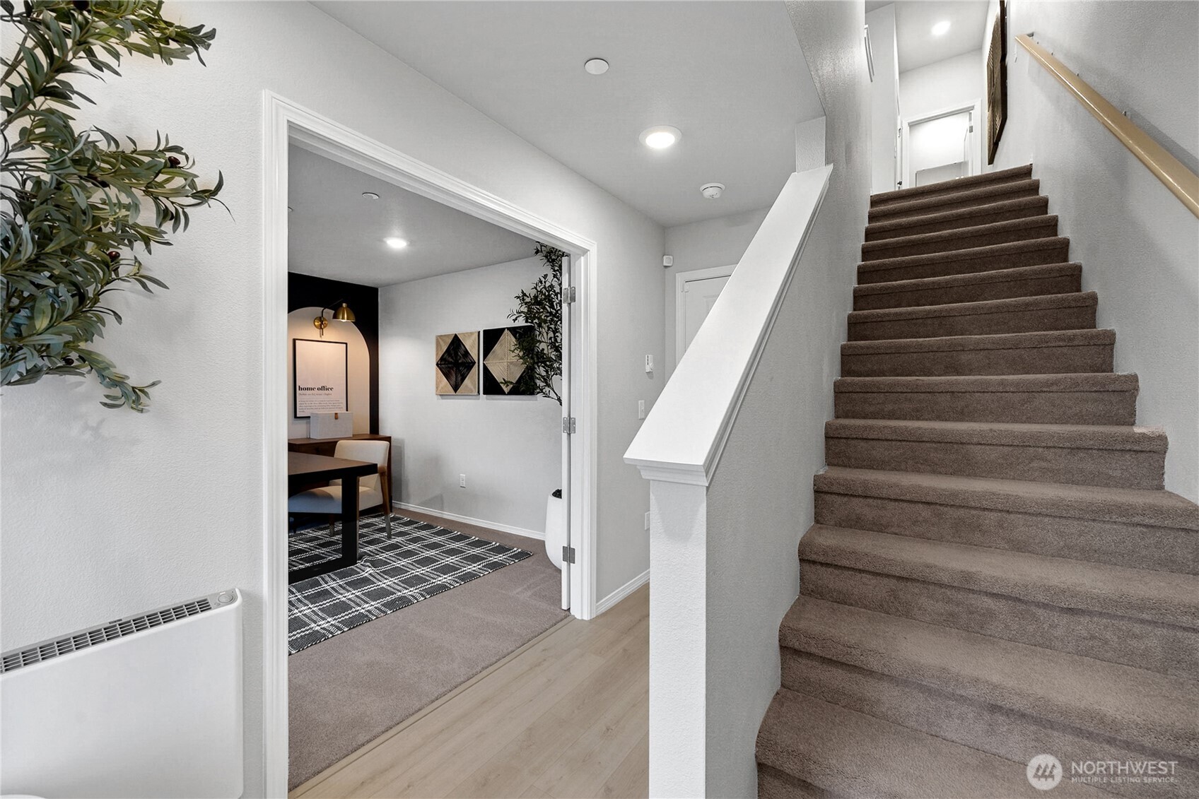 34370 Emerald Ridge Avenue Southeast Black Diamond, WA 98010 - Photo 2 of 12 a view of entryway and hall with wooden floor