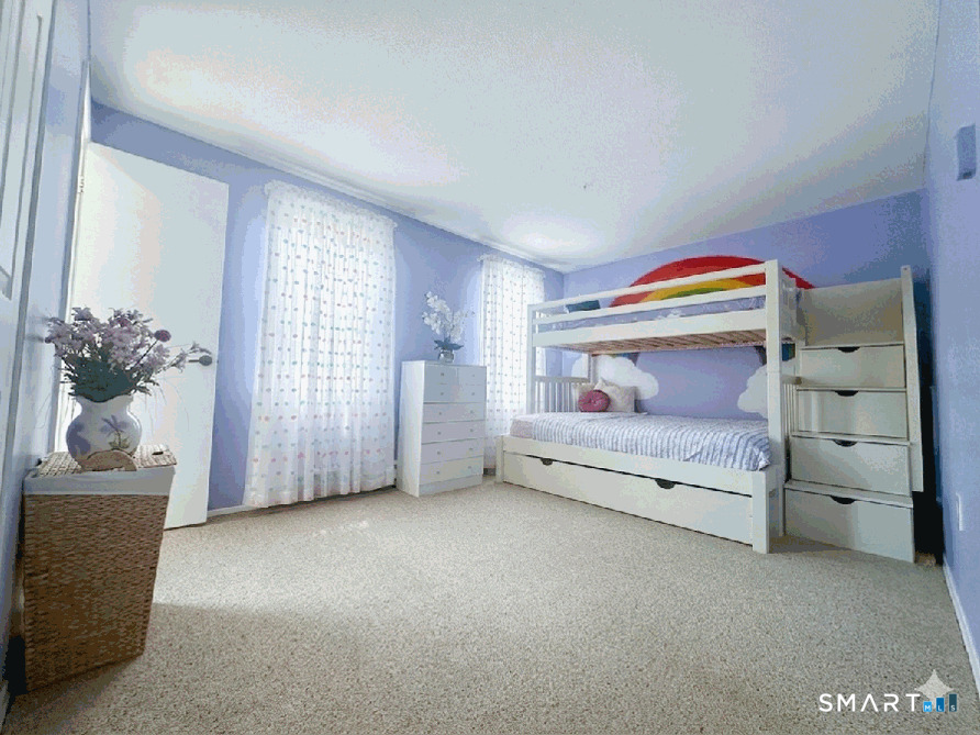 2 Lakeside Drive, Unit M Ledyard, CT 06339 - Photo 27 of 38 a bedroom with a bed and a window
