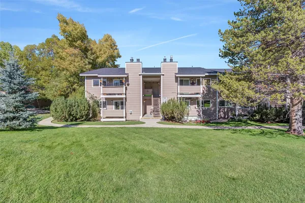 front view of a house with a big yard