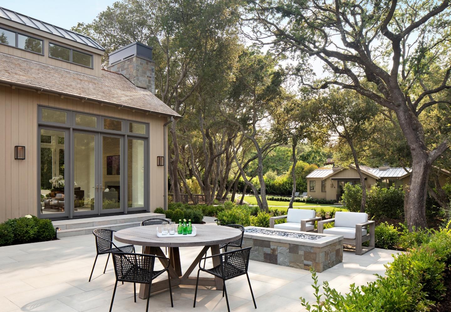440 Walsh Road Atherton, CA 94027 - Photo 16 of 17 a view of a patio with table and chairs and potted plants