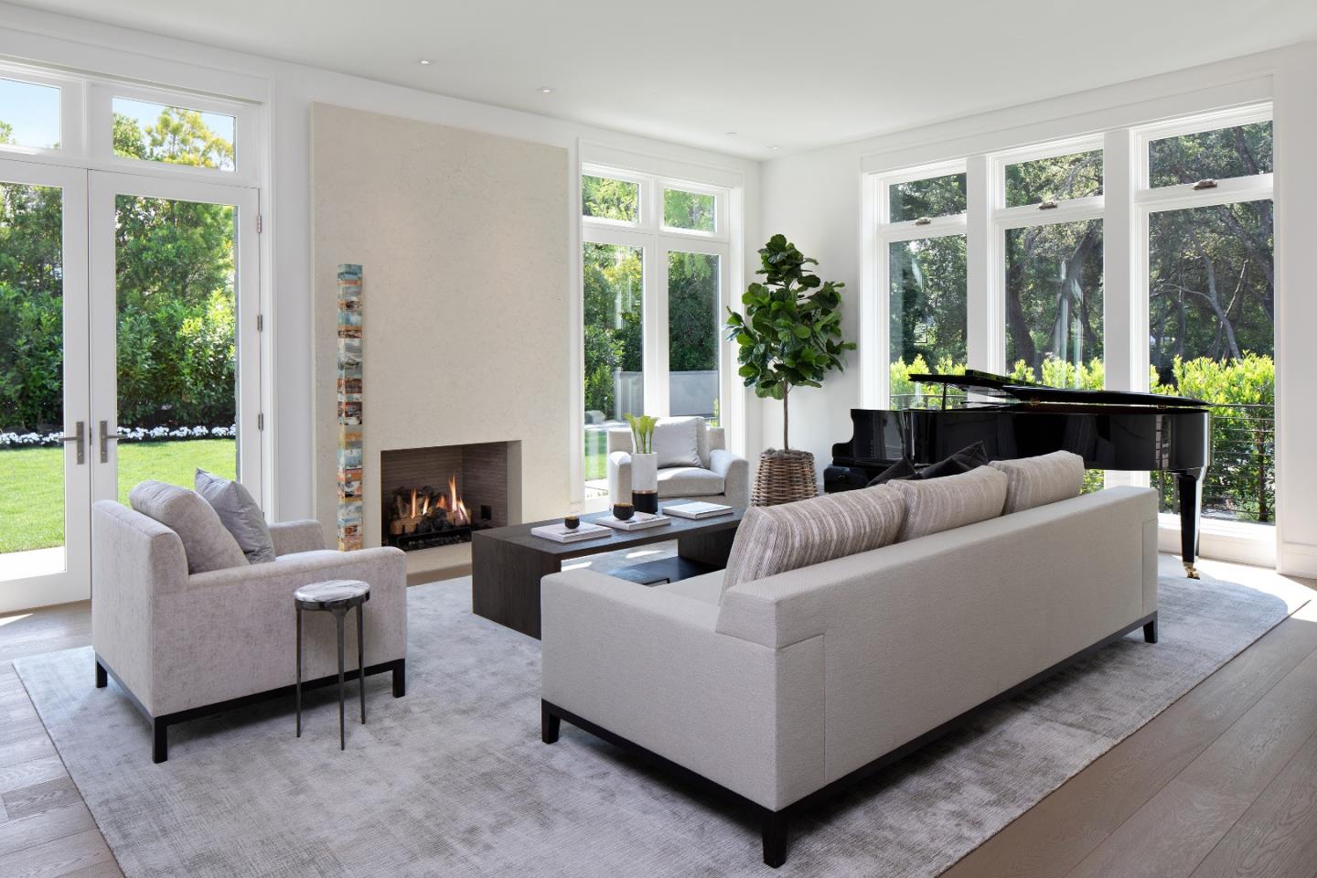 440 Walsh Road Atherton, CA 94027 - Photo 3 of 17 a living room with furniture and a fireplace