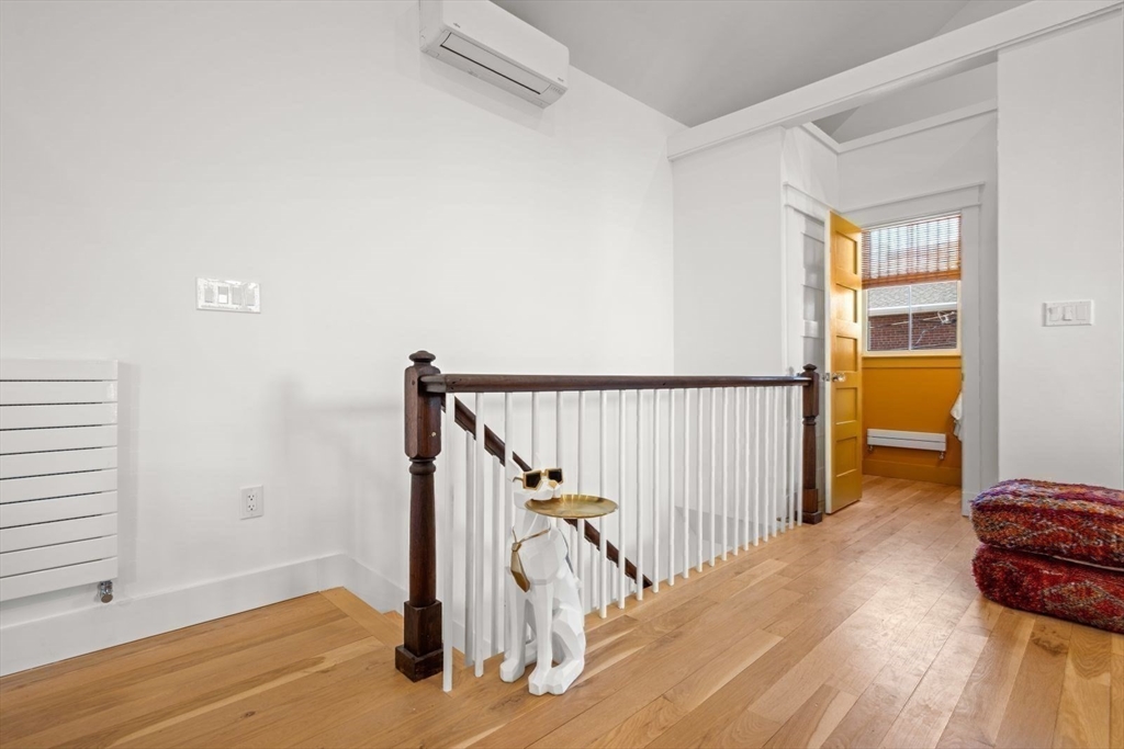 22 Mitchell Street, Unit 1 Boston, MA 02127 - Photo 16 of 41 a view of entryway and hall with wooden floor