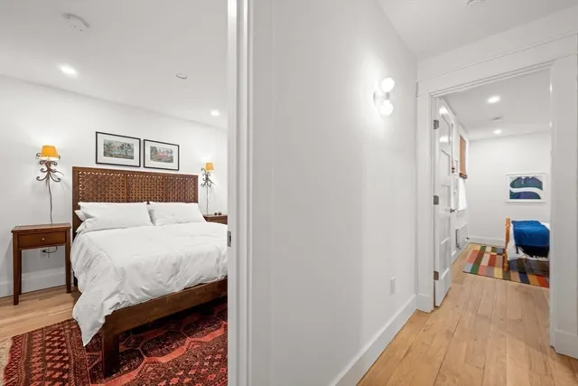 a bedroom with a bed and a view of bathroom