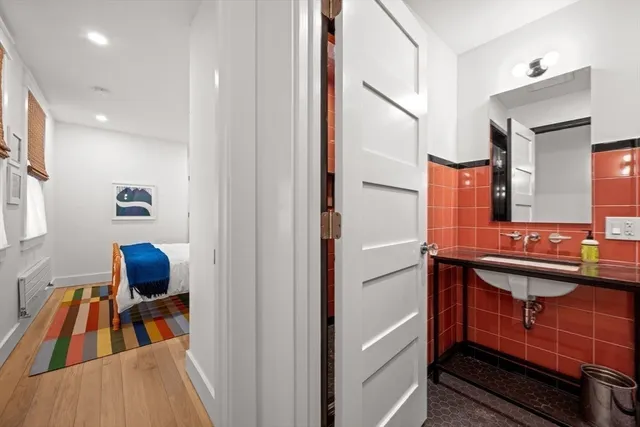 a view of living room and workspace