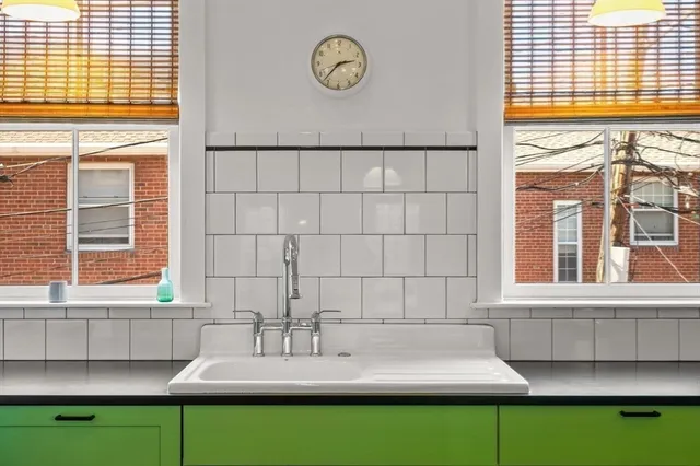 a kitchen with a sink and a window
