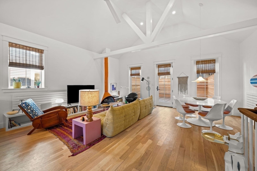22 Mitchell Street, Unit 1 Boston, MA 02127 - Photo 5 of 41 a living room with furniture fireplace and a window