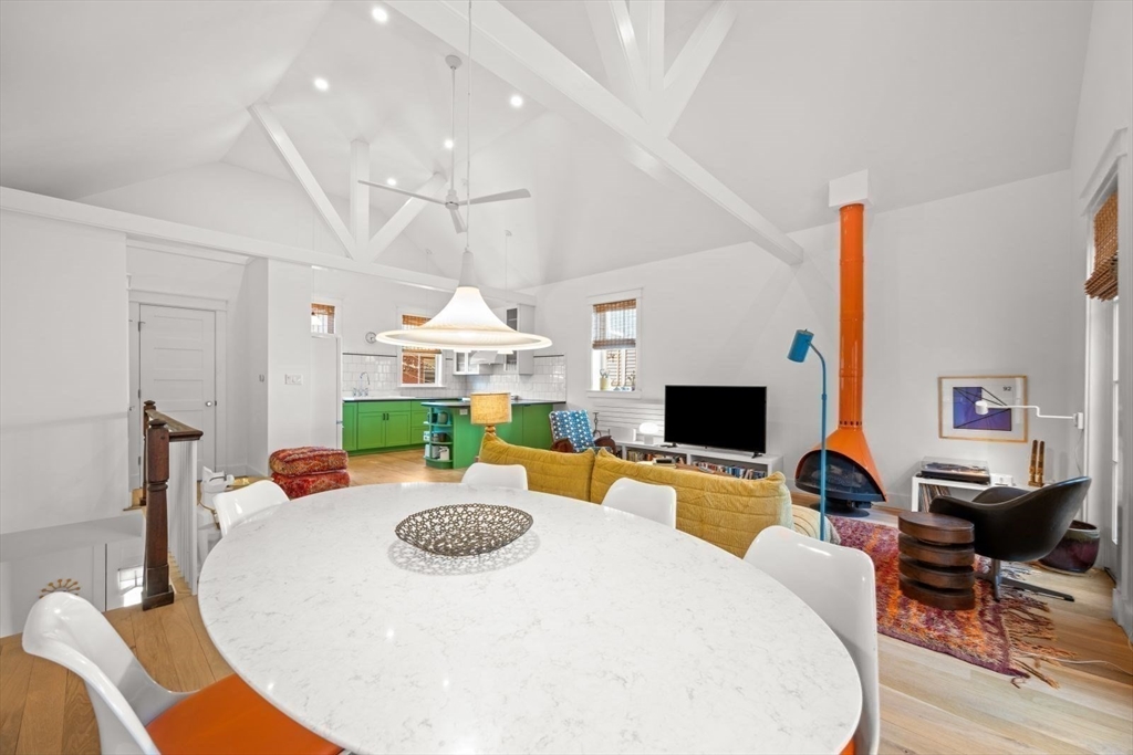 22 Mitchell Street, Unit 1 Boston, MA 02127 - Photo 8 of 41 a living room with fireplace furniture and a flat screen tv