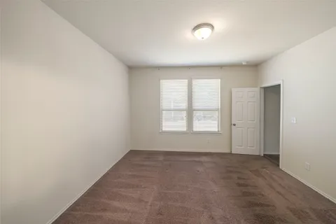 a bathroom with a double vanity sink mirror and shower