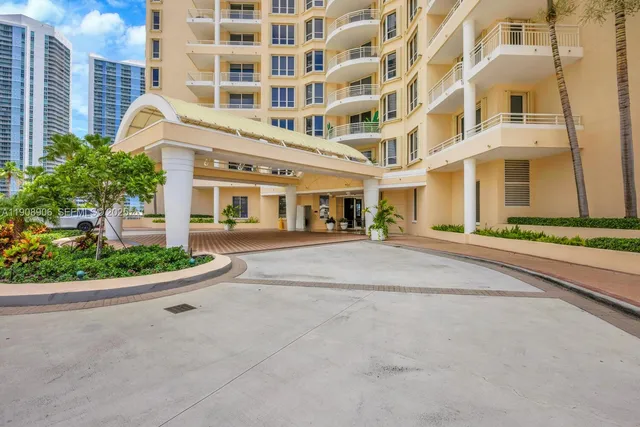 a view of a kitchen with wooden floor and a sink