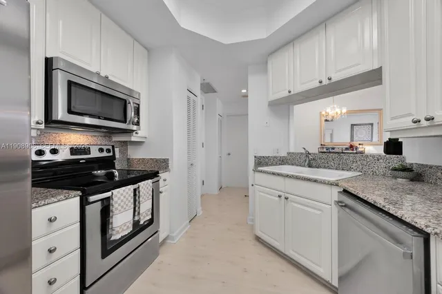 a bed room with a bed and a window