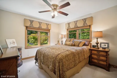 a bed room with a bed and a tv