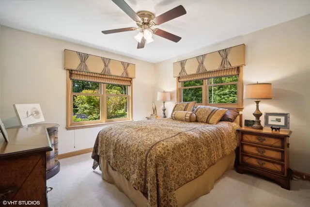 a bed room with a bed and a tv