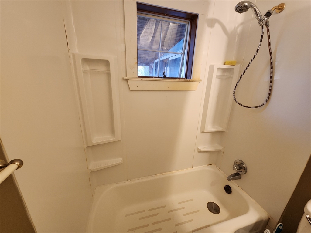 68 Hudson Road Stow, MA 01775 - Photo 12 of 39 a bathroom with a bath tub and a shower