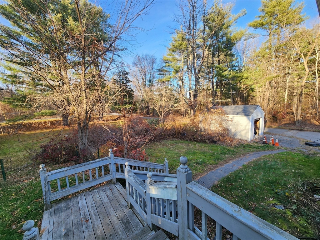 68 Hudson Road Stow, MA 01775 - Photo 26 of 39 a view of a deck with a yard