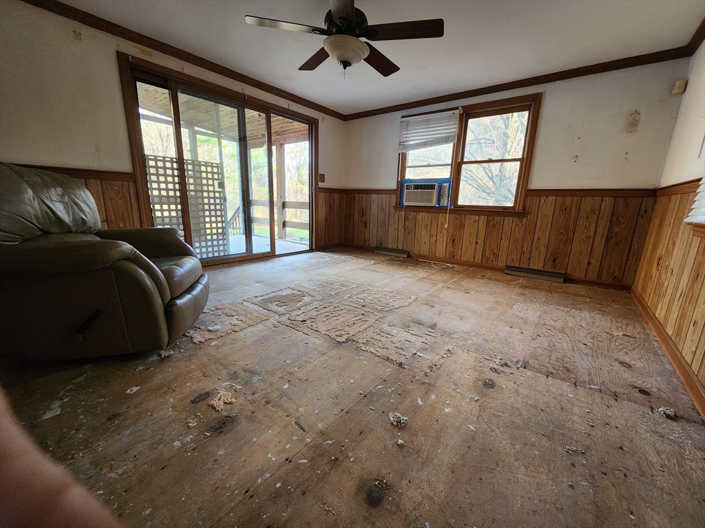 68 Hudson Road Stow, MA 01775 - Photo 6 of 39 a view of a livingroom with a ceiling fan and window
