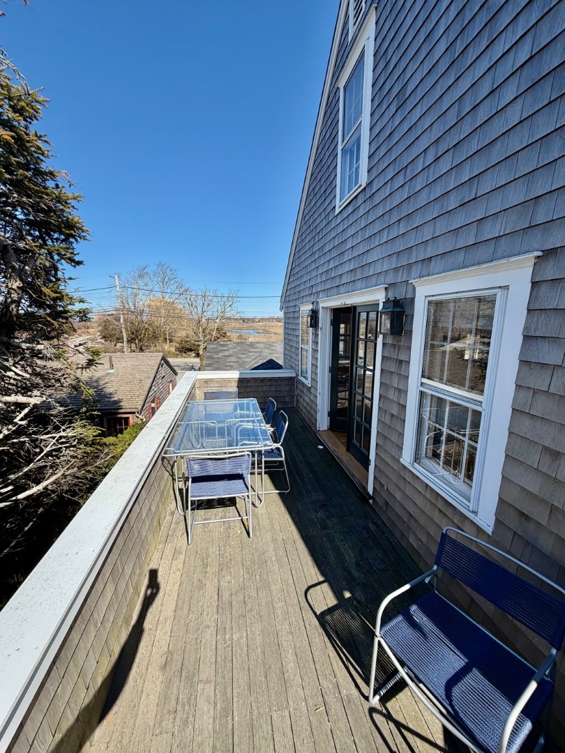 163 Orange Street Nantucket, MA 02554 - Photo 12 of 22 a view of roof deck with patio