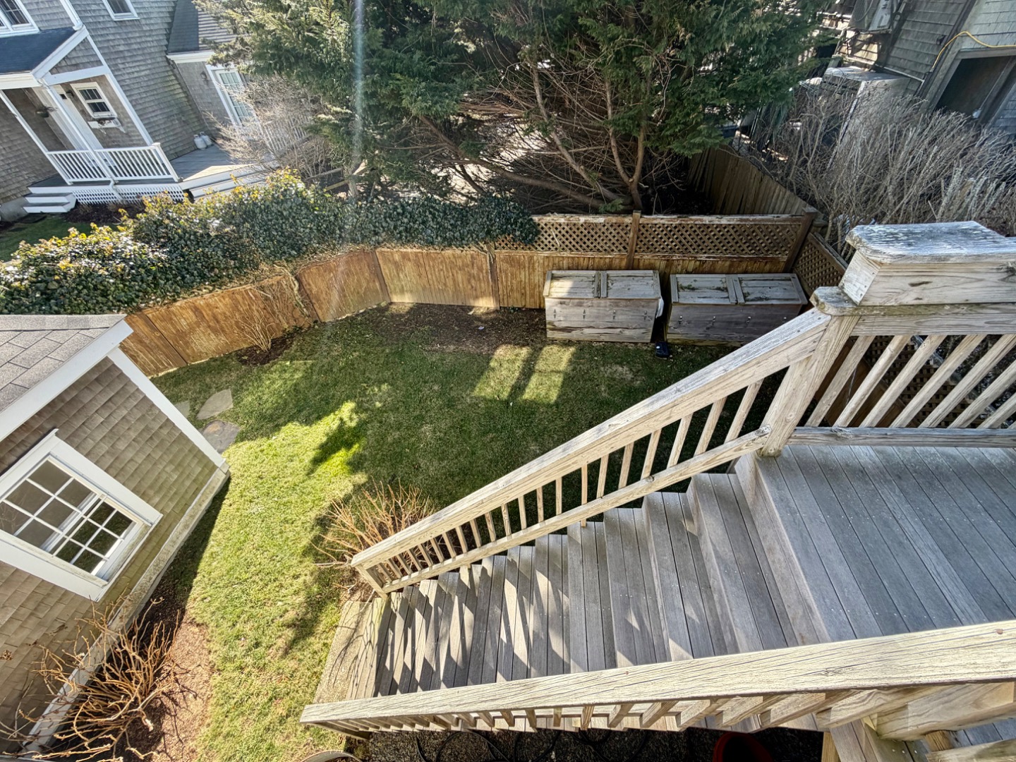 163 Orange Street Nantucket, MA 02554 - Photo 19 of 22 a view of a wooden deck with furniture