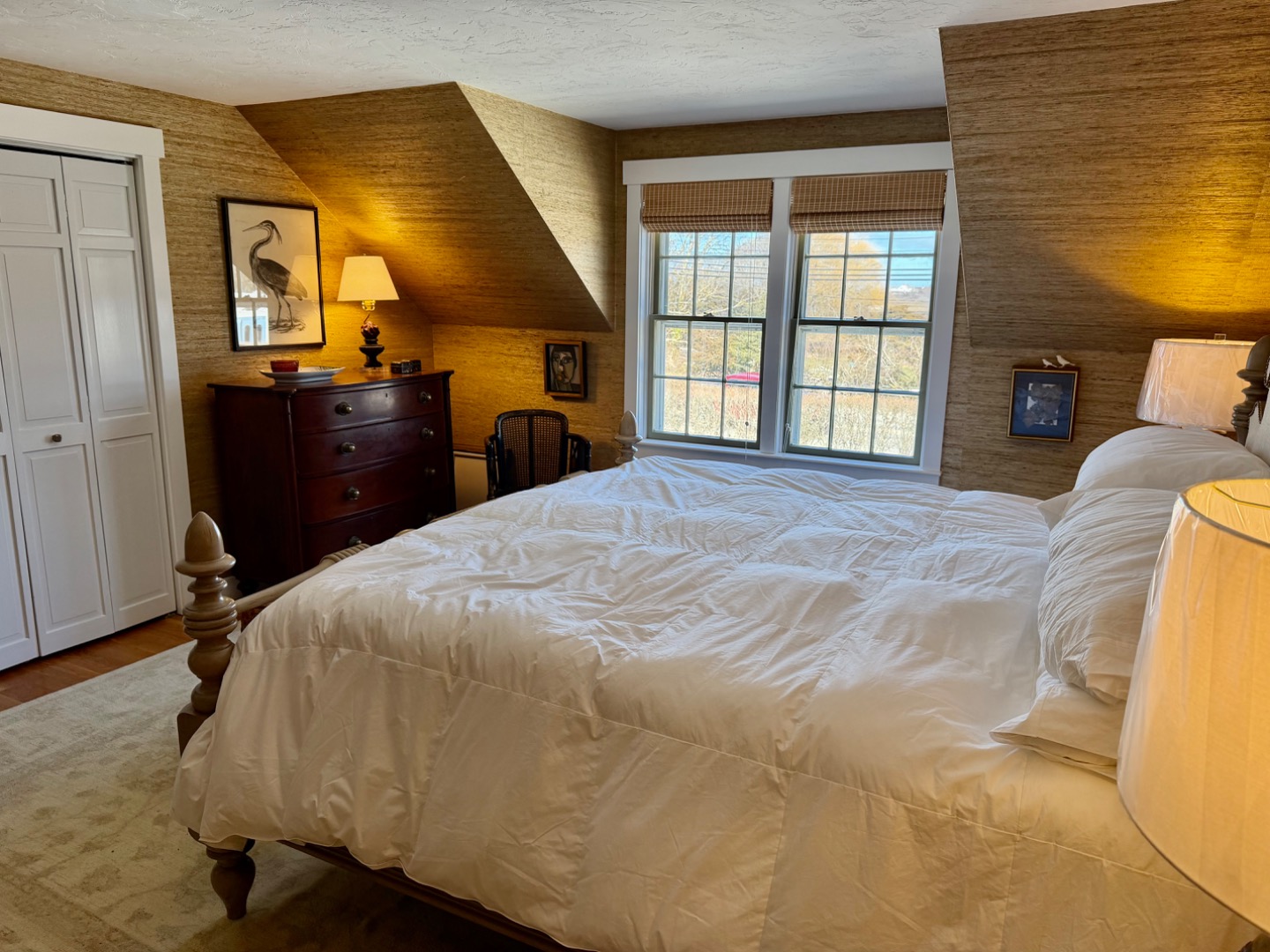 163 Orange Street Nantucket, MA 02554 - Photo 10 of 22 a bedroom with a bed and window