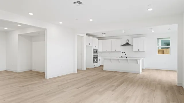 a view of kitchen with microwave and stove