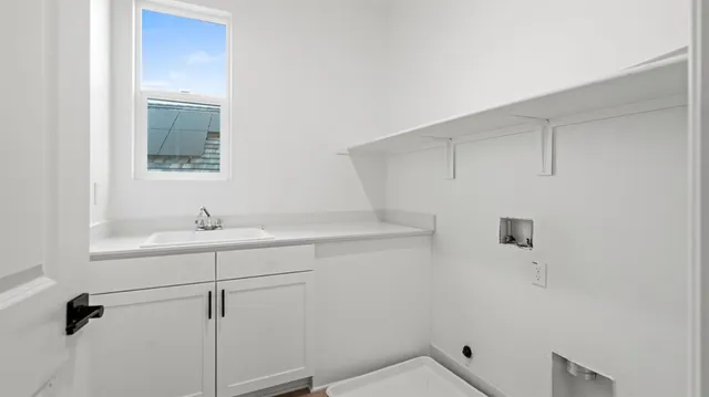 a bathroom with a sink and vanity