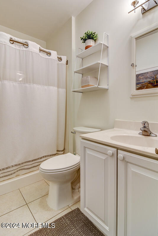 212 Philadelphia Avenue Point Pleasant Beach, NJ 08742 - Photo 17 of 31 a bathroom with a sink toilet and shower