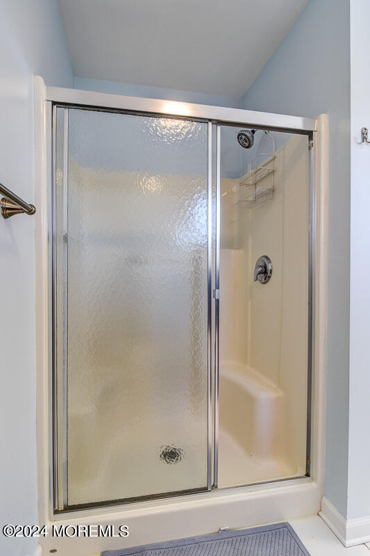 212 Philadelphia Avenue Point Pleasant Beach, NJ 08742 - Photo 21 of 31 a bathroom with a glass shower door