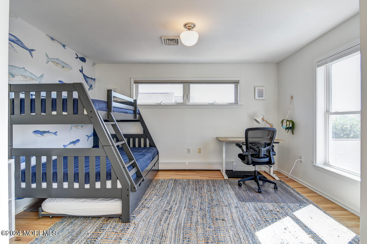 212 Philadelphia Avenue Point Pleasant Beach, NJ 08742 - Photo 23 of 31 a bedroom with furniture and a window