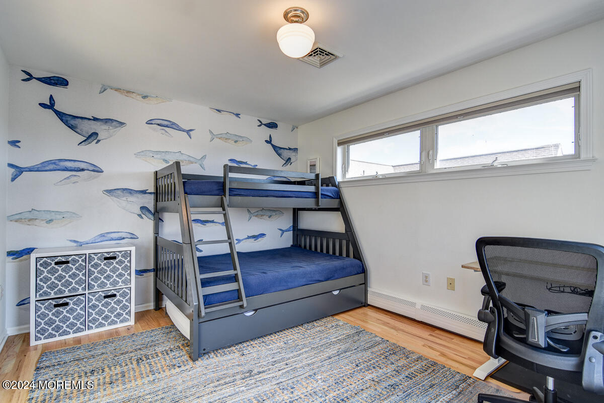 212 Philadelphia Avenue Point Pleasant Beach, NJ 08742 - Photo 24 of 31 a bedroom with furniture and a window
