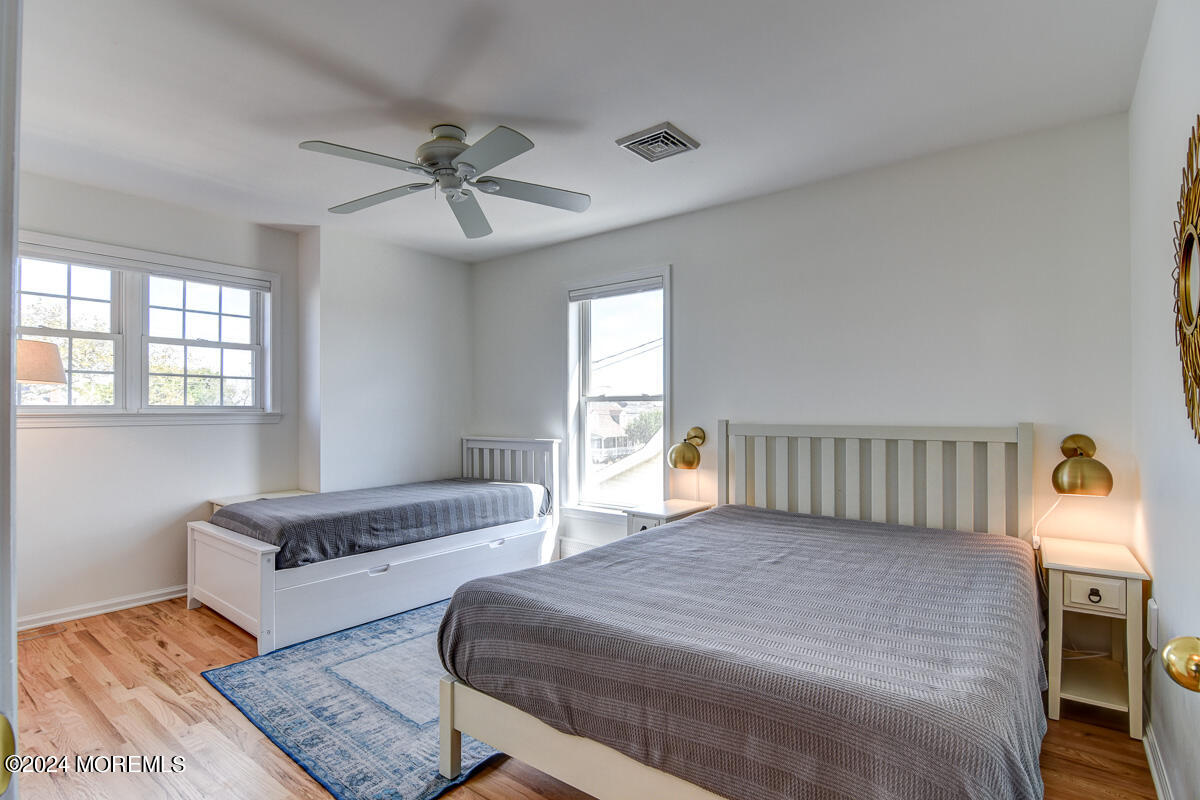 212 Philadelphia Avenue Point Pleasant Beach, NJ 08742 - Photo 25 of 31 a bedroom with a bed and window