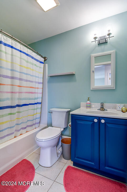 212 Philadelphia Avenue Point Pleasant Beach, NJ 08742 - Photo 28 of 31 a bathroom with a toilet sink and mirror