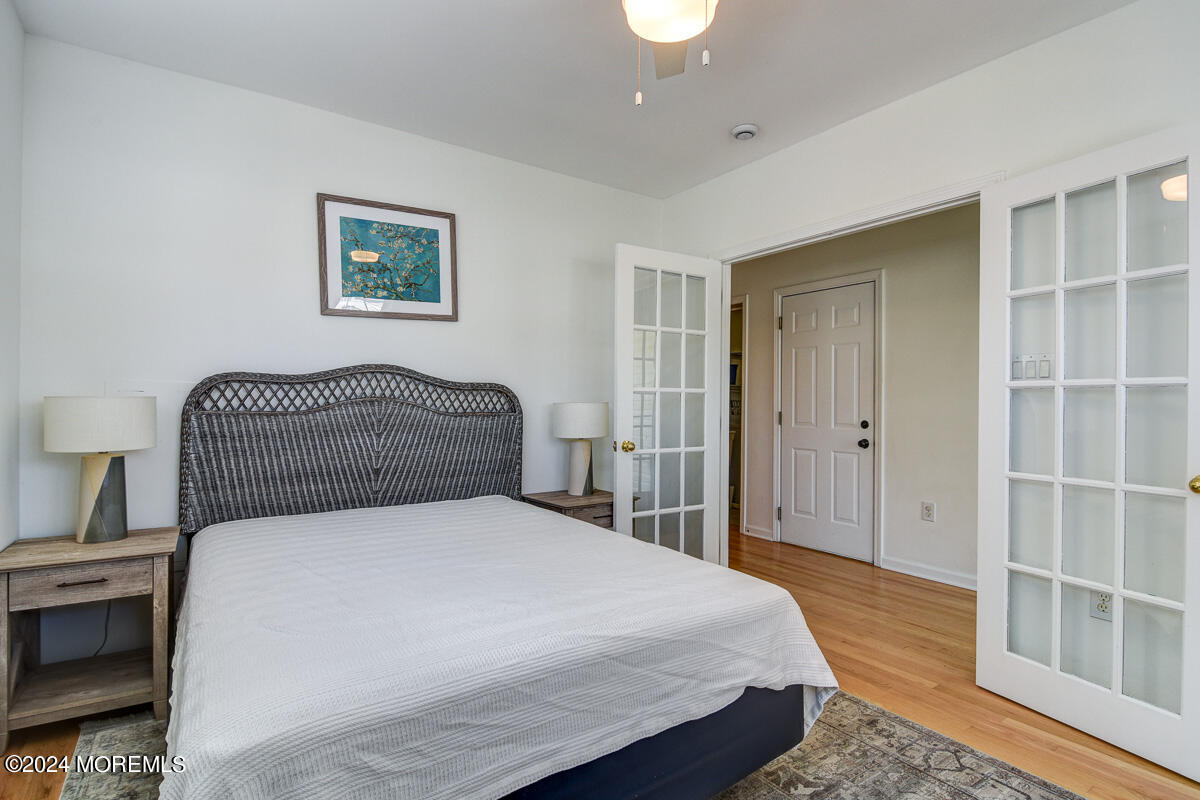 212 Philadelphia Avenue Point Pleasant Beach, NJ 08742 - Photo 6 of 31 a bedroom with a bed and a window