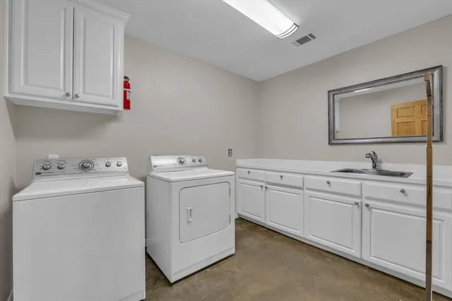 a view of a swimming pool with outdoor seating