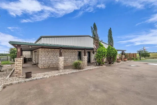 a view of a house with a patio