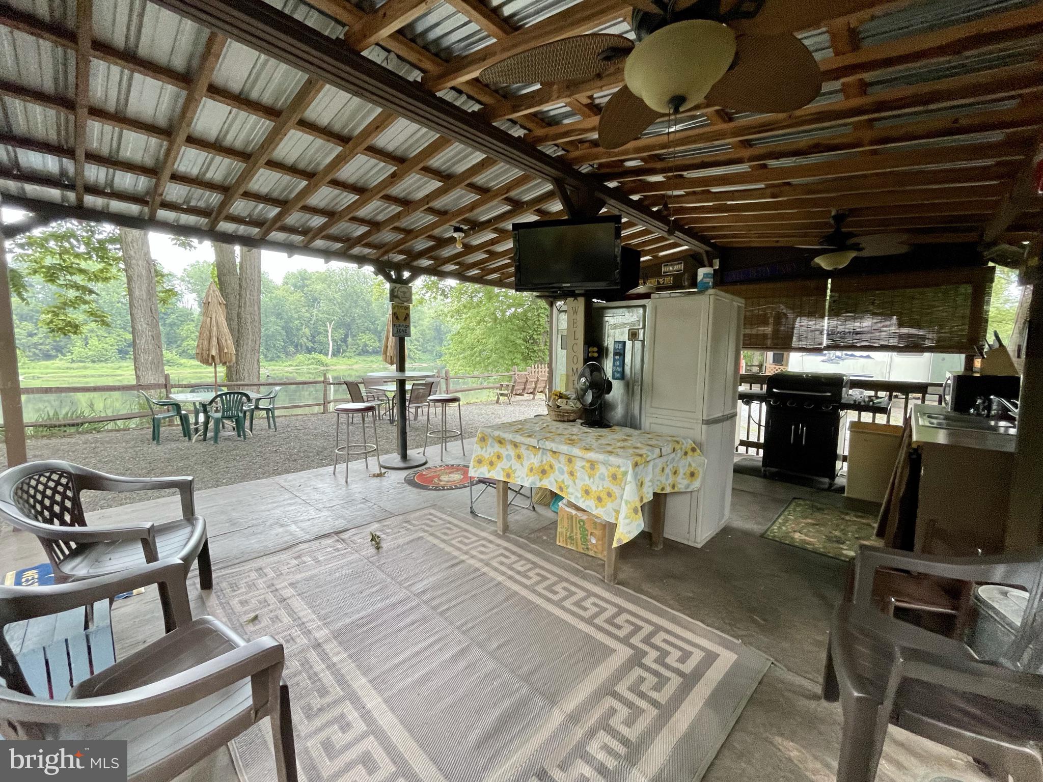 512 Risinger Road Hedgesville, WV 25427 - Photo 45 of 93 out door kitchen seating area