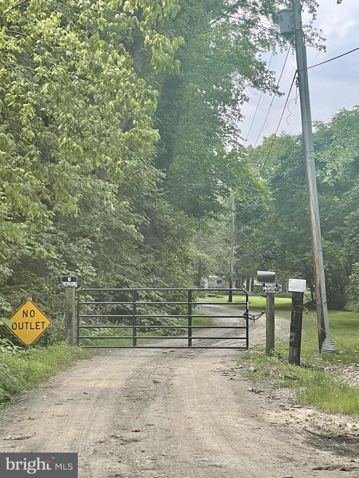 512 Risinger Road Hedgesville, WV 25427 - Photo 7 of 93 Locked gate halfway down Risinger Rd