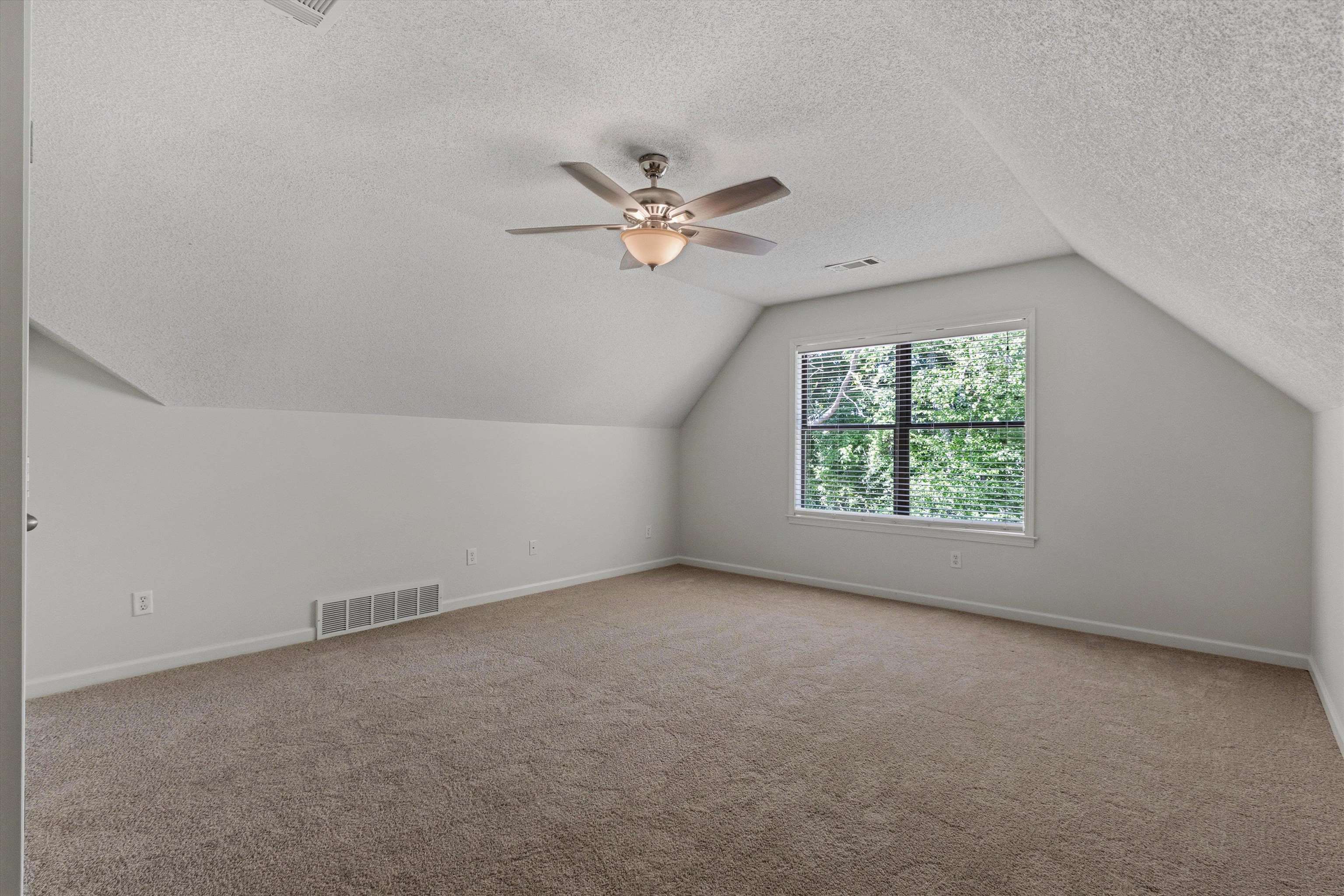 3671 Haynes Road Bartlett, TN 38133 - Photo 31 of 40 an empty room with windows and fan