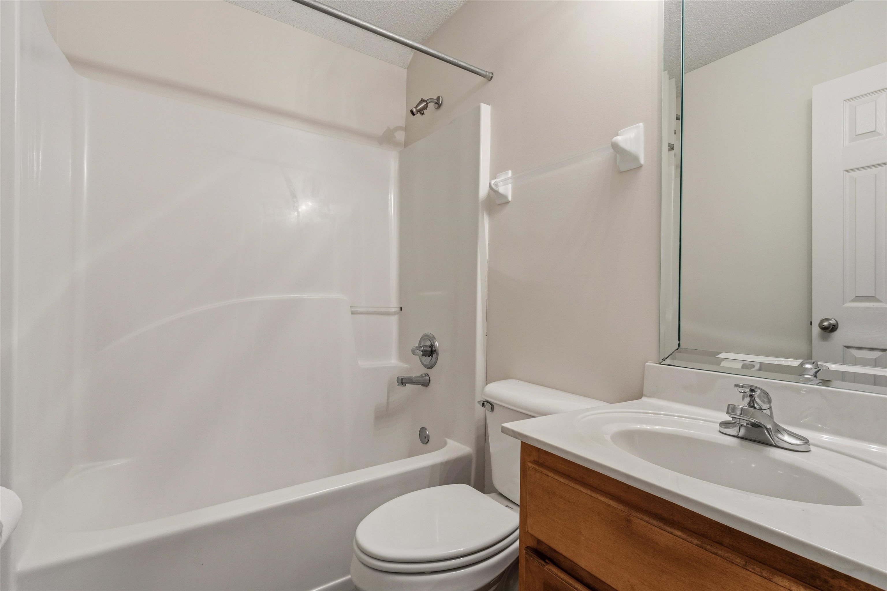 3671 Haynes Road Bartlett, TN 38133 - Photo 33 of 40 a bathroom with a sink toilet and shower