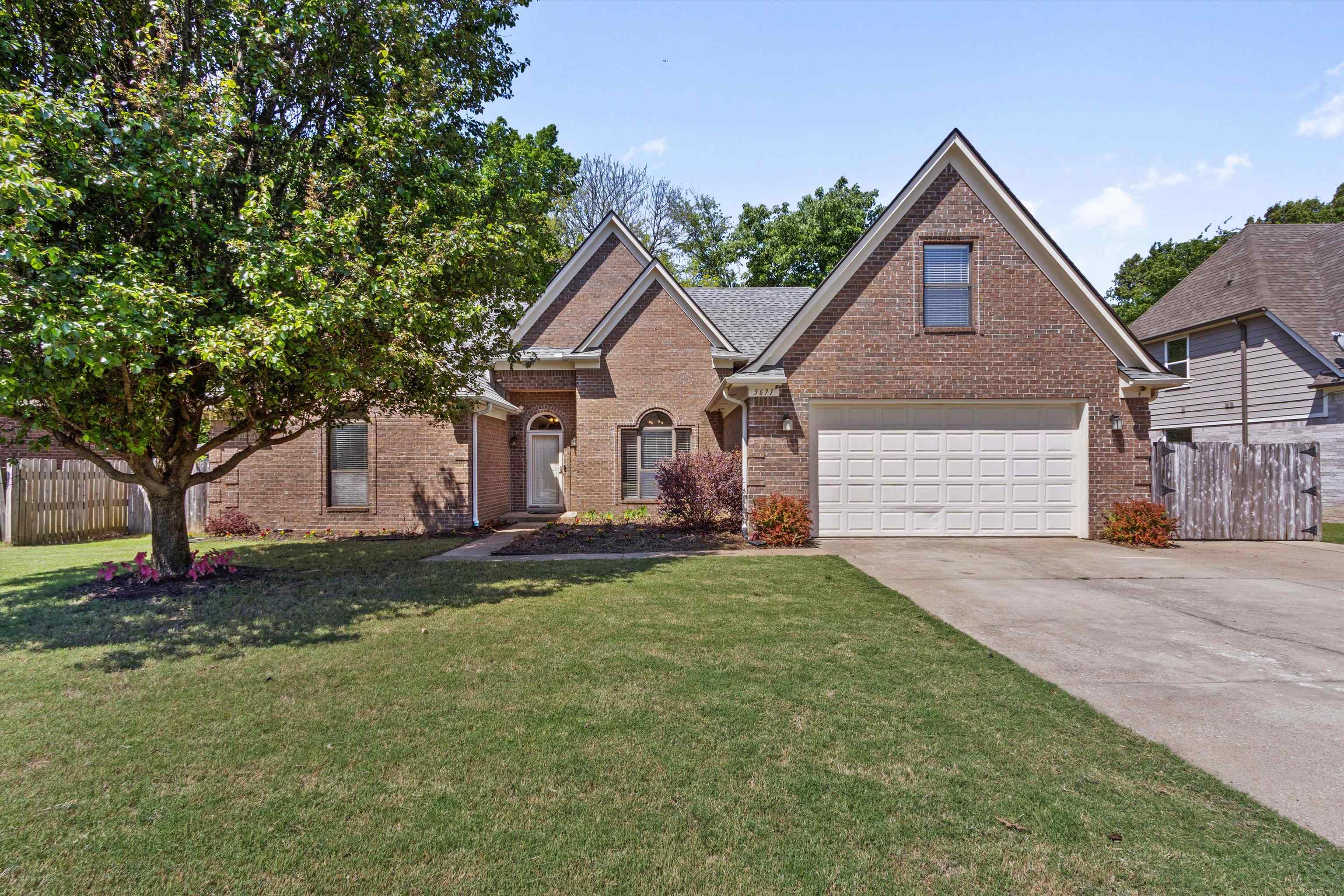 3671 Haynes Road Bartlett, TN 38133 - Photo 40 of 40 a view of a house with a yard and large tree