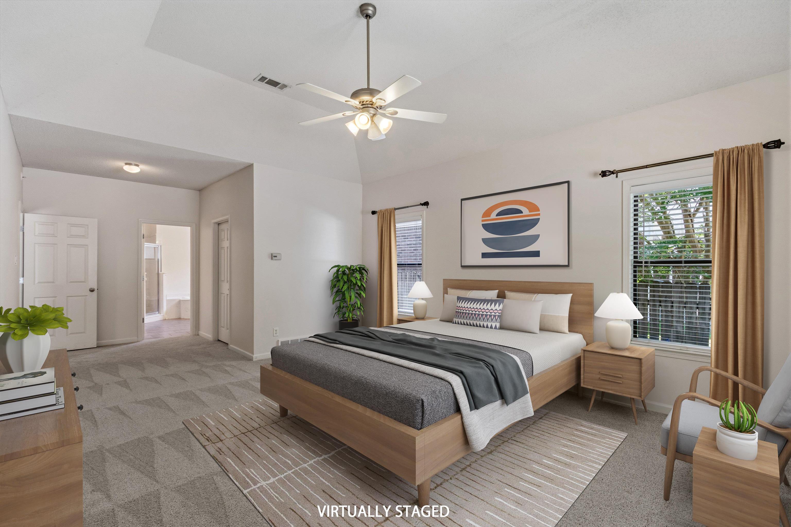 3671 Haynes Road Bartlett, TN 38133 - Photo 6 of 40 a bedroom with a large bed and a chandelier