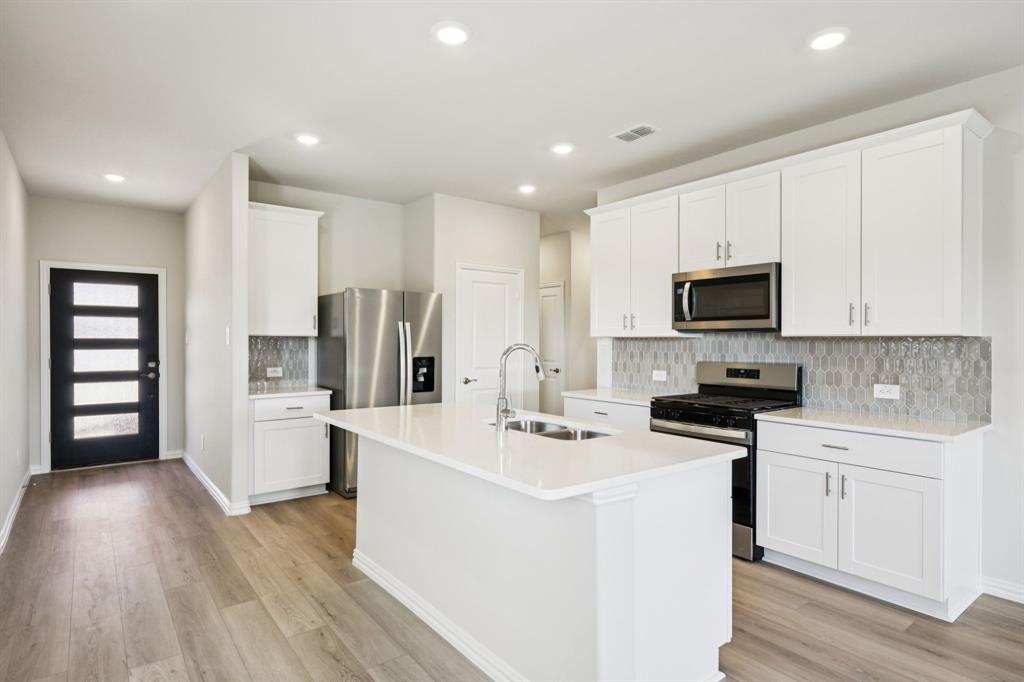 Photo is not of the actual home, but is an inspirational photo of builder’s model home and may depict options, furnishings, and/or decorator features that are not included.